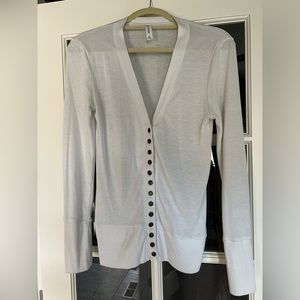 Woman’s long white cardigan
